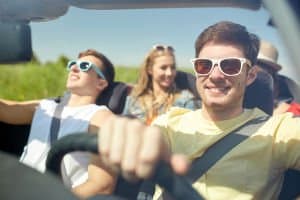 teens driving in convertible