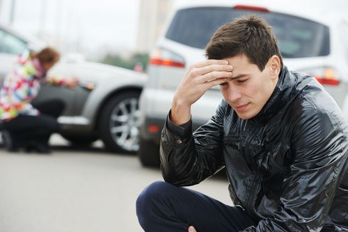 person looking upset after uninsured motorist accident
